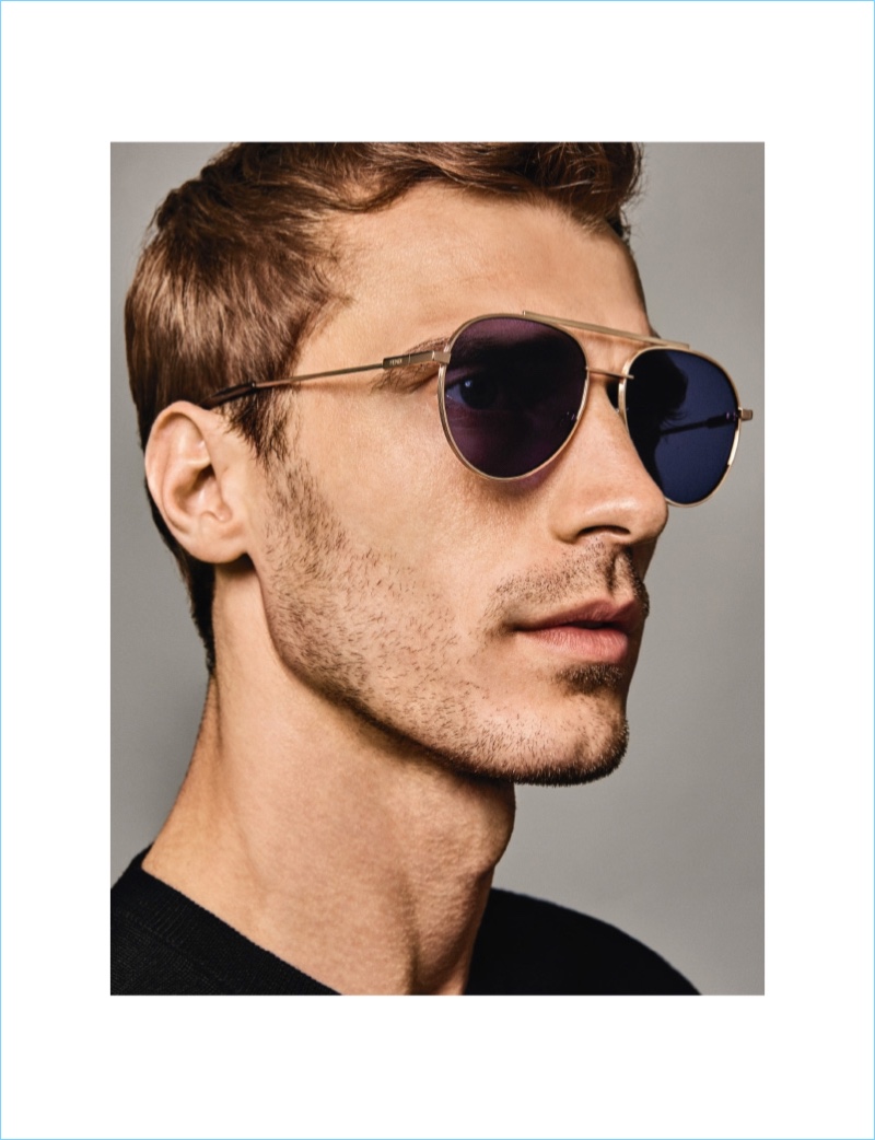Delivering a side profile, Clément Chabernaud wears Fendi sunglasses.