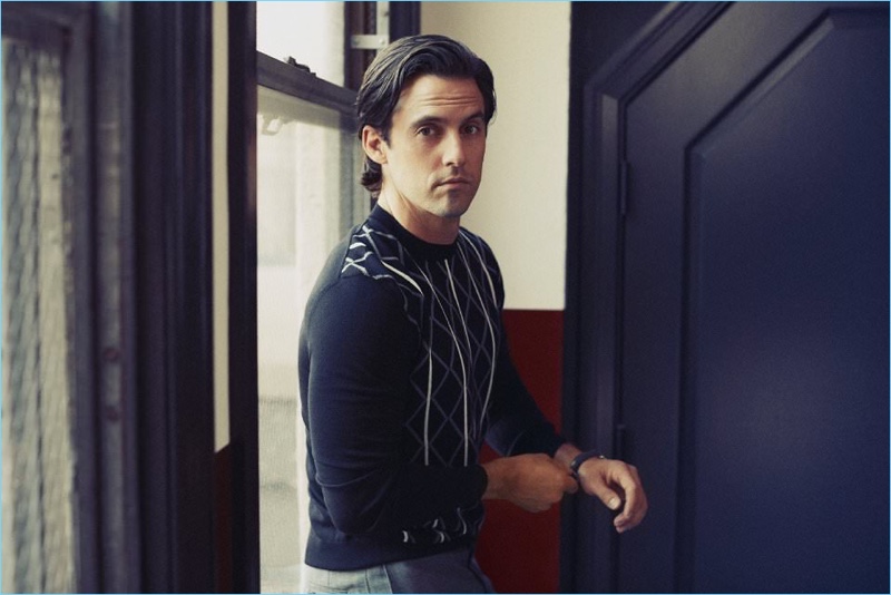 Actor Milo Ventimiglia wears a Prada sweater with a Piaget Polo S Automatic Chronograph watch.