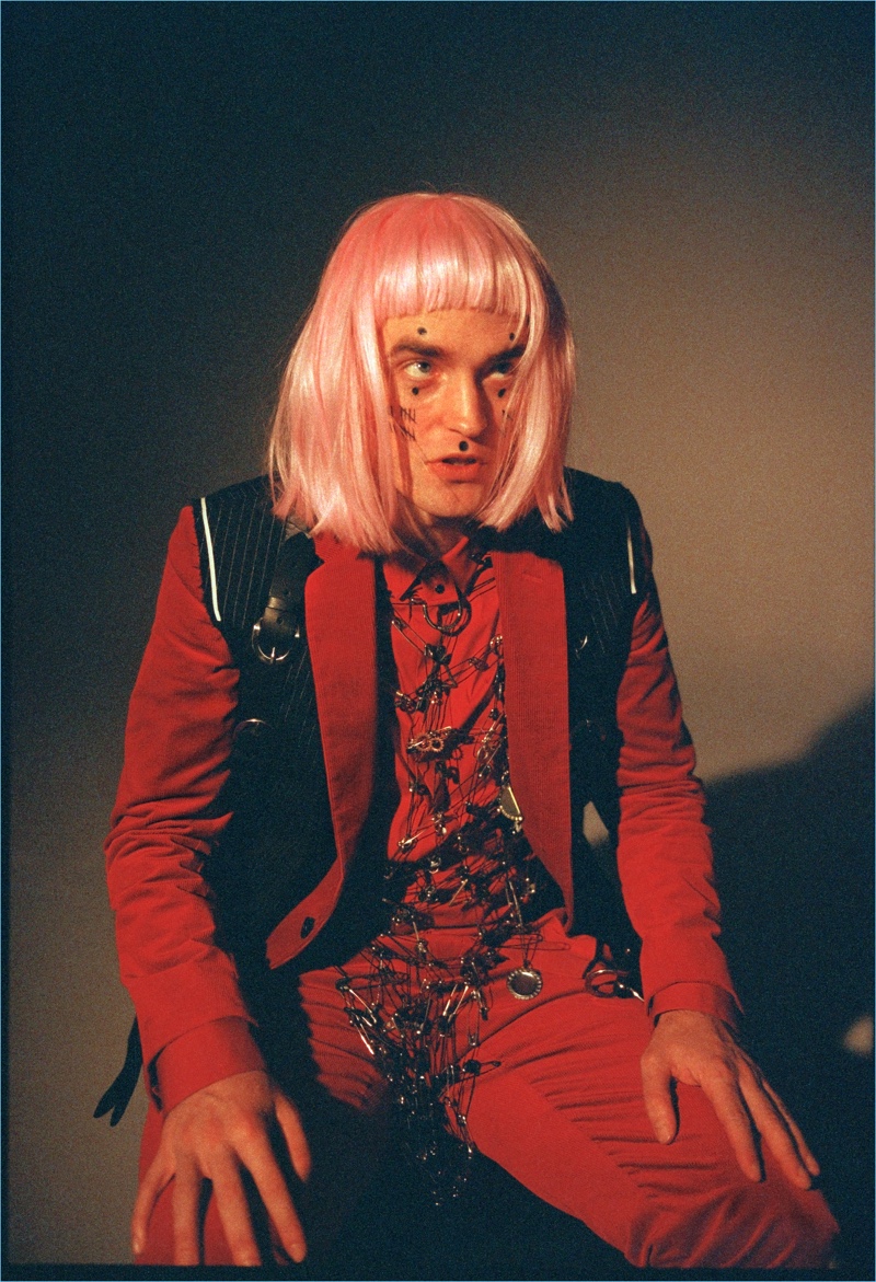 Sporting a pink wig, Robert Pattinson stars in a photo shoot for Wonderland.