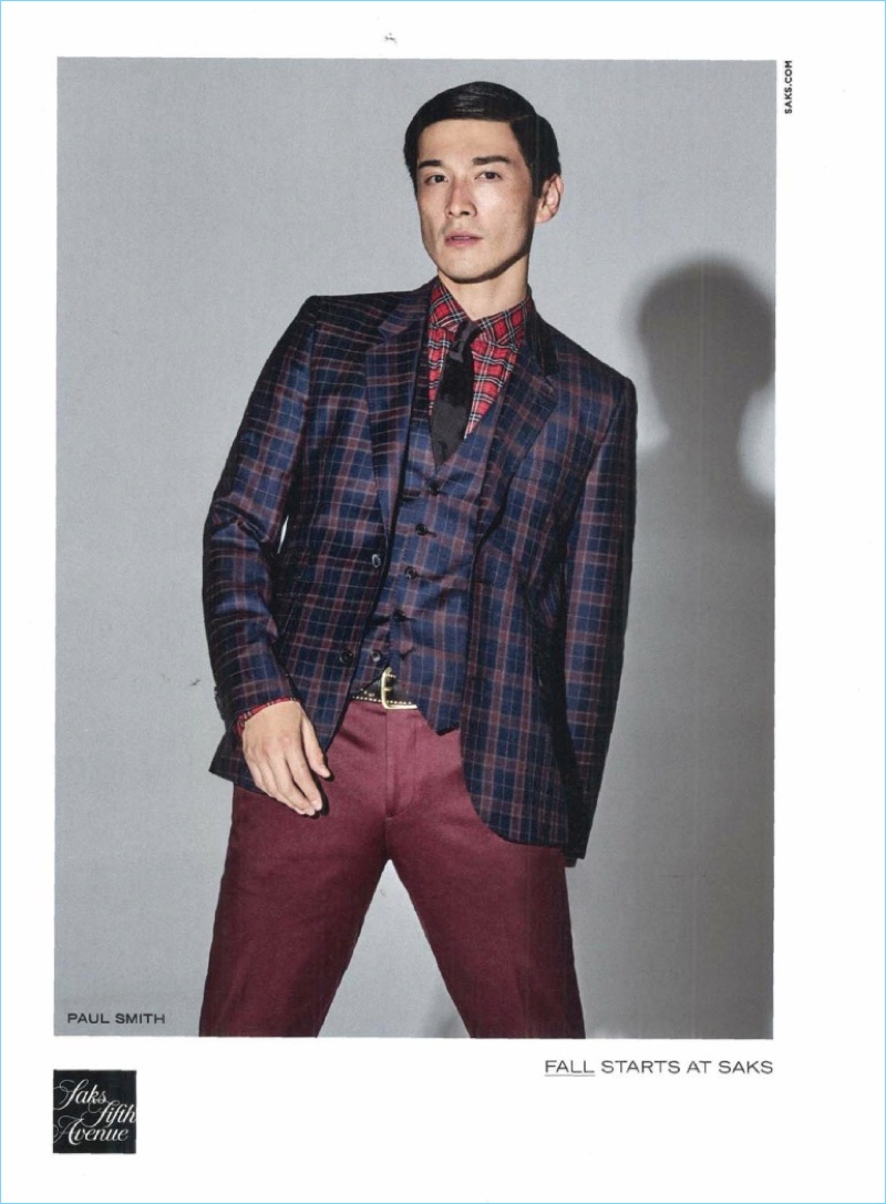 Japanese model Daisuke Ueda dons check tailoring from Paul Smith.