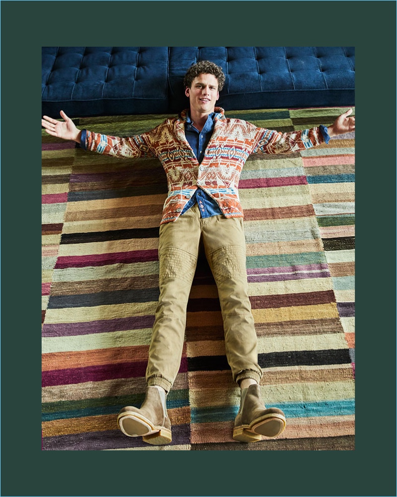 American Rag is front and center with a folk geometric shawl cardigan $60. Model Simon Nessman also sports an American Rag embroidered denim shirt $45 and moto jogger pants $45.