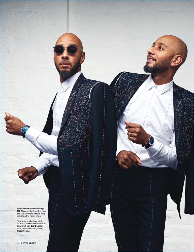 Donning a Dior Homme suit and Thom Browne sunglasses, Swizz Beatz also wears a Zenith watch.