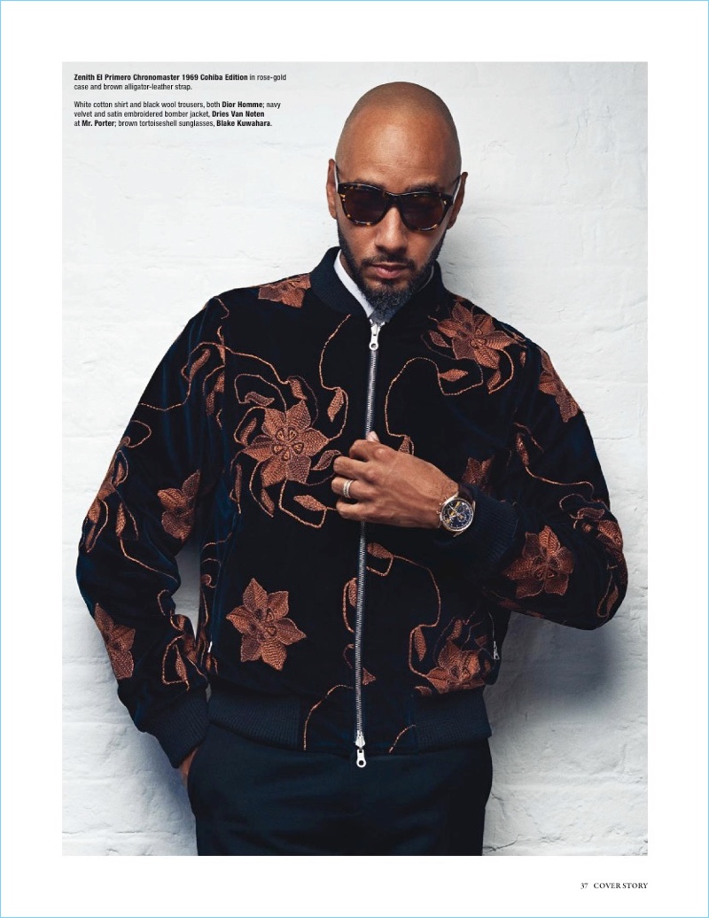 Playing it cool, Swizz Beatz rocks a Dries Van Noten bomber jacket with a shirt and trousers by Dior Homme. His look is complete with Blake Kuwahara sunglasses and a Zenith watch.