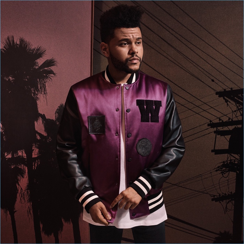 A cool vision, The Weeknd sports a H&M padded baseball jacket $59.99 with a wide-cut t-shirt $14.99.