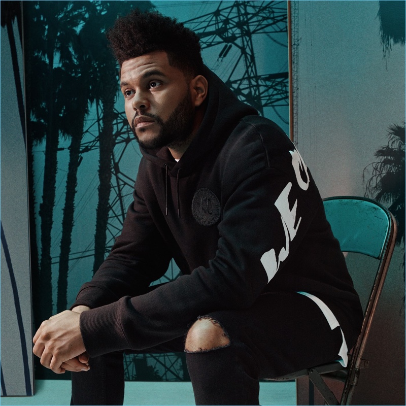 Starring in a new H&M campaign, The Weeknd wears an oversize hoodie $34.99 in black.