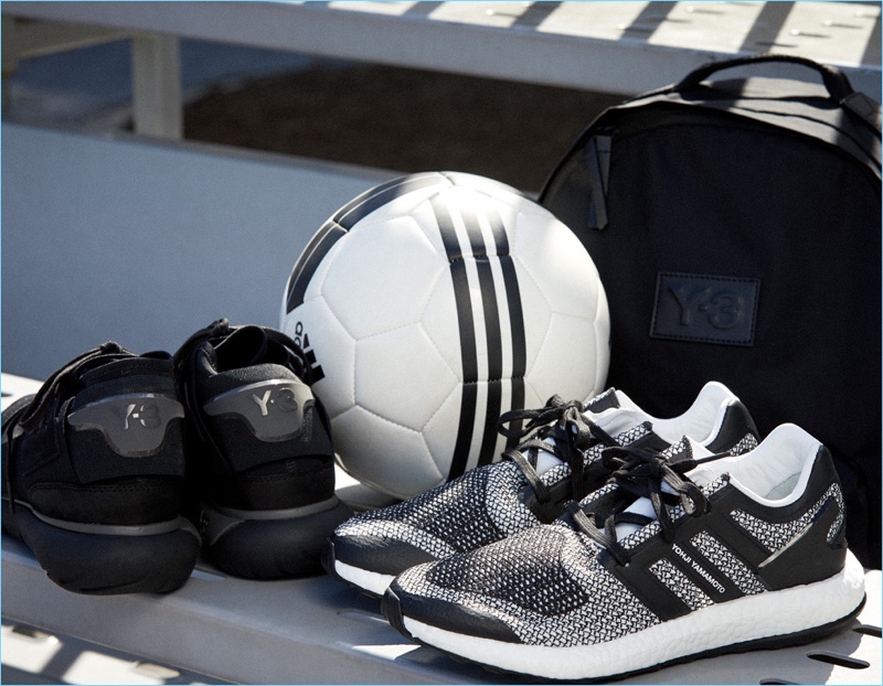 Update your sporty essentials with Y-3. Left to Right: Y-3 Qasa High sneakers $390, Pureboost sneakers $320, and Techlite backpack $220.