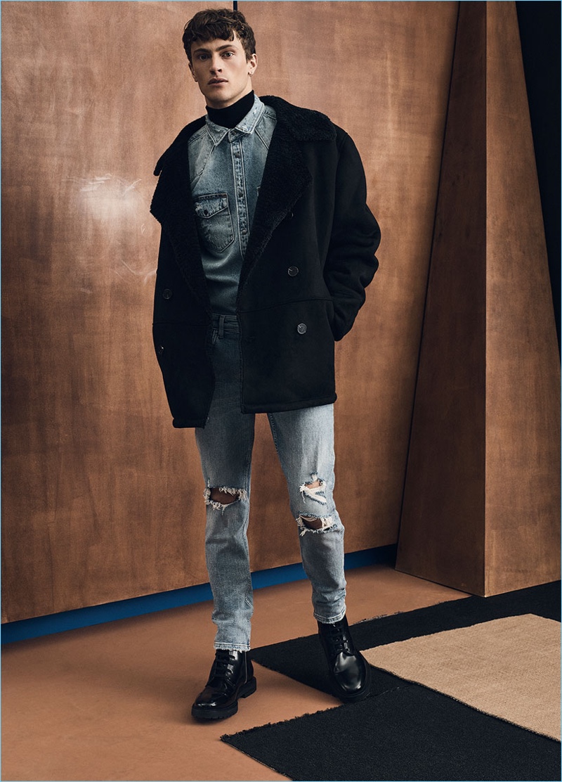 Take a style cue from Zara and mix up your double denim with an oversize coat.