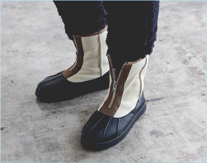 One of Phillip Lim's personal favorites, the designer turns out UGG PL Classic Short Duck boots $300 in ivory and black.