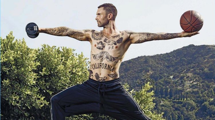 Working out, a shirtless Adam Levine appears in a photo shoot for Men's Fitness.