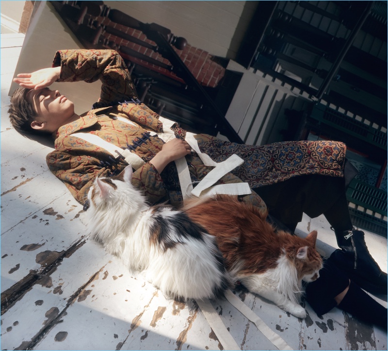 Laying down, Sup Park wears a Craig Green coat with Barneys New York boots. » Barneys is Mad About Cats for Fall '17 Campaign Laying down, Sup Park wears a Craig Green coat with Barneys New York boots.