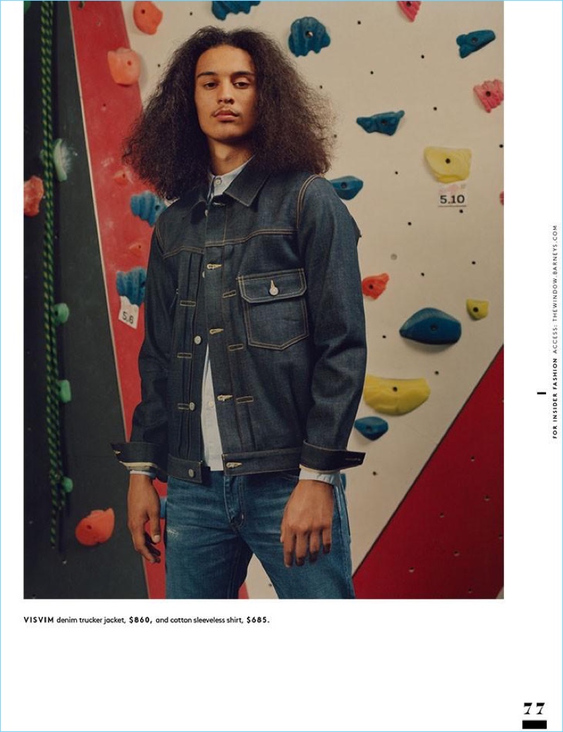 Doubling down on denim, Taj Figueroa wears a Visvim denim trucker jacket and sleeveless shirt.