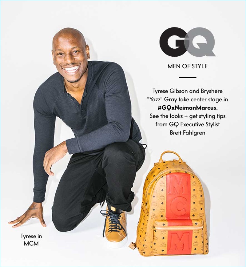 All smiles, Tyrese rocks a pair of MCM high-top sneakers $495. He is pictured with the brand's stark stripe Visetos backpack $820.