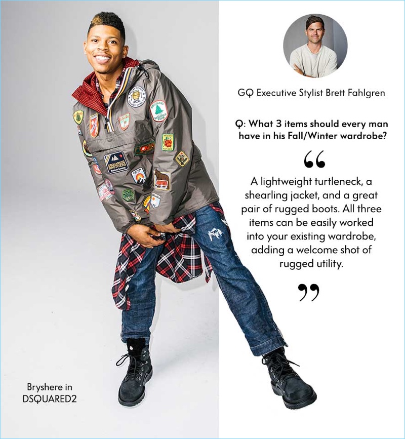 Ready for camping, Bryshere "Yazz" Gray wears a complete look by Dsquared2. His outfit includes a packable jacket $1,930, oversize flannel shirt $795, jeans $660, and boots $1,080.