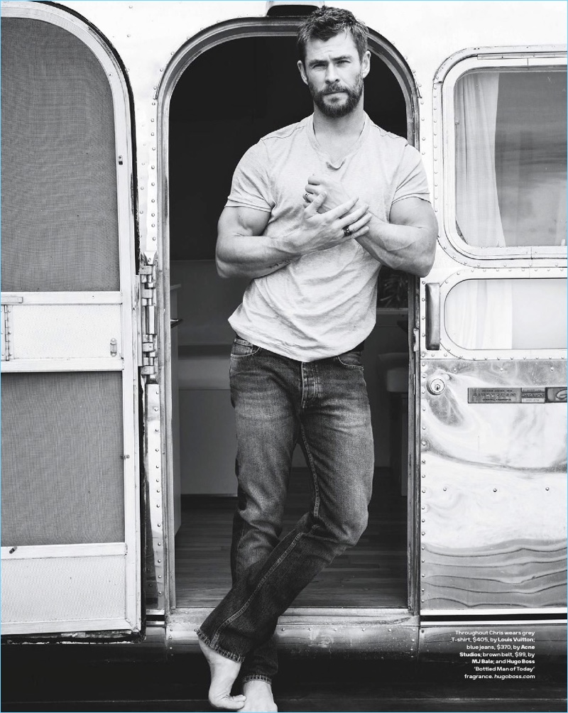Actor Chris Hemsworth wears a Louis Vuitton t-shirt and Acne Studios jeans.