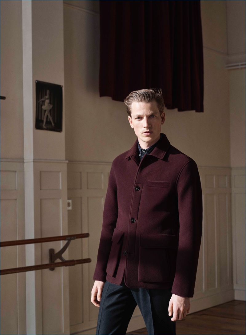 Hugo Sauzay sports a burgundy jacket and pleated trousers from De Fursac's fall-winter 2017 collection.