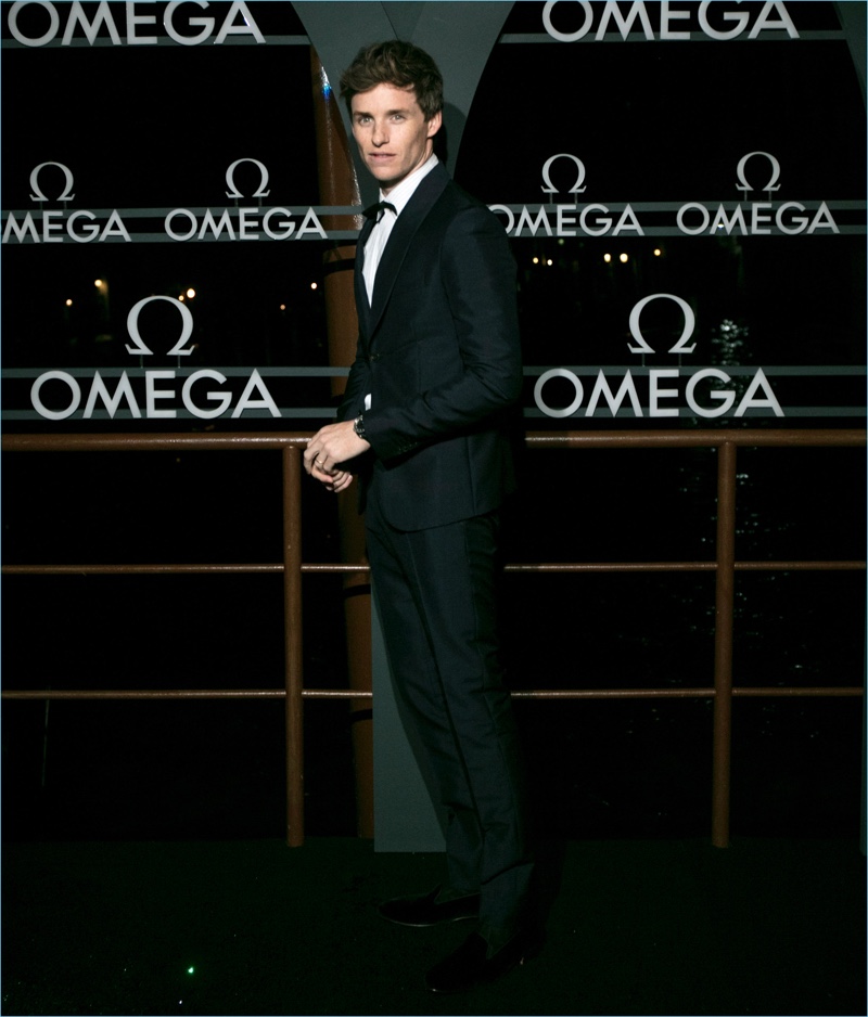 Eddie Redmayne wears a sharp tuxedo for a special evening out with OMEGA.