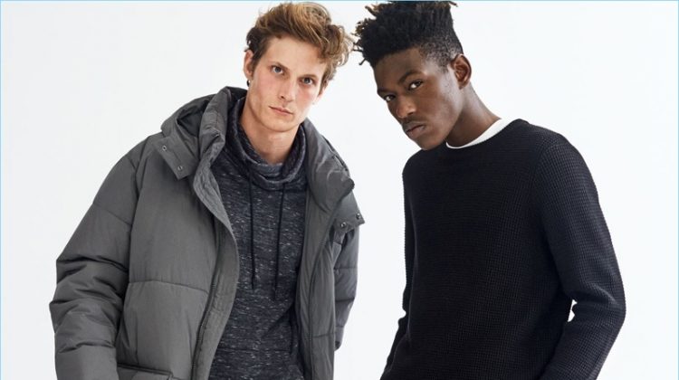 Left: Embracing the oversize trend, Felix Gesnouin wears a reflective parka, cowl collared sweatshirt, and slim-fit pants by H&M. Right: Model Sheani Gist sports a H&M textured sweater, t-shirt, and twill pants.