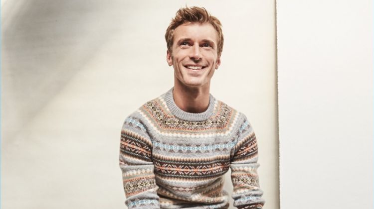 All smiles, Clément Chabernaud dons J.Crew's fairisle sweater. The French model also wears J.Crew 484 slim-fit corduroy pants and Red Wing chukka boots.