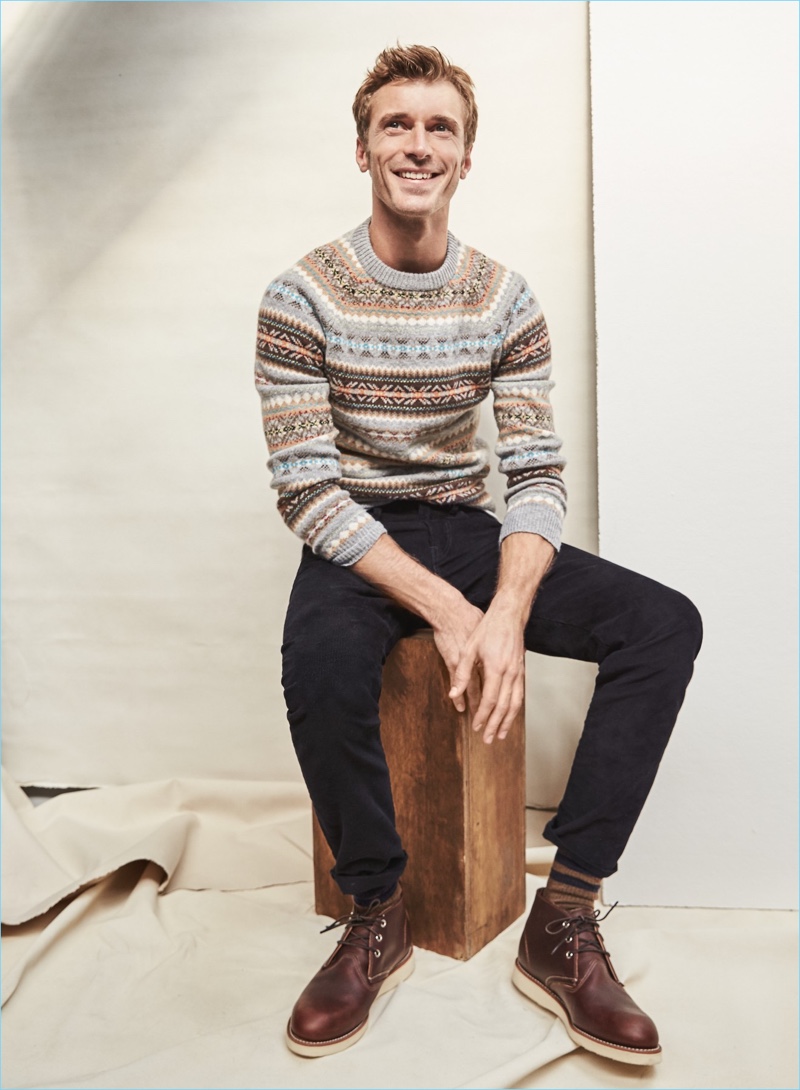 All smiles, Clément Chabernaud dons J.Crew's fairisle sweater. The French model also wears J.Crew 484 slim-fit corduroy pants and Red Wing chukka boots. 