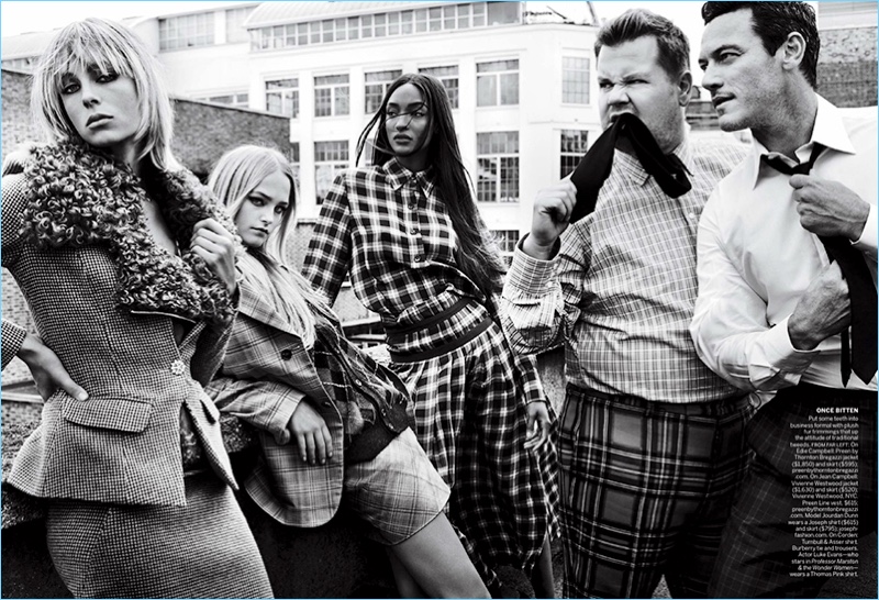 Luke Evans joins James Corden for his Vogue shoot. Evans sports a Thomas Pink shirt while Corden wears a Turnbull & Asser shirt. He also dons a Burberry tie and trousers.