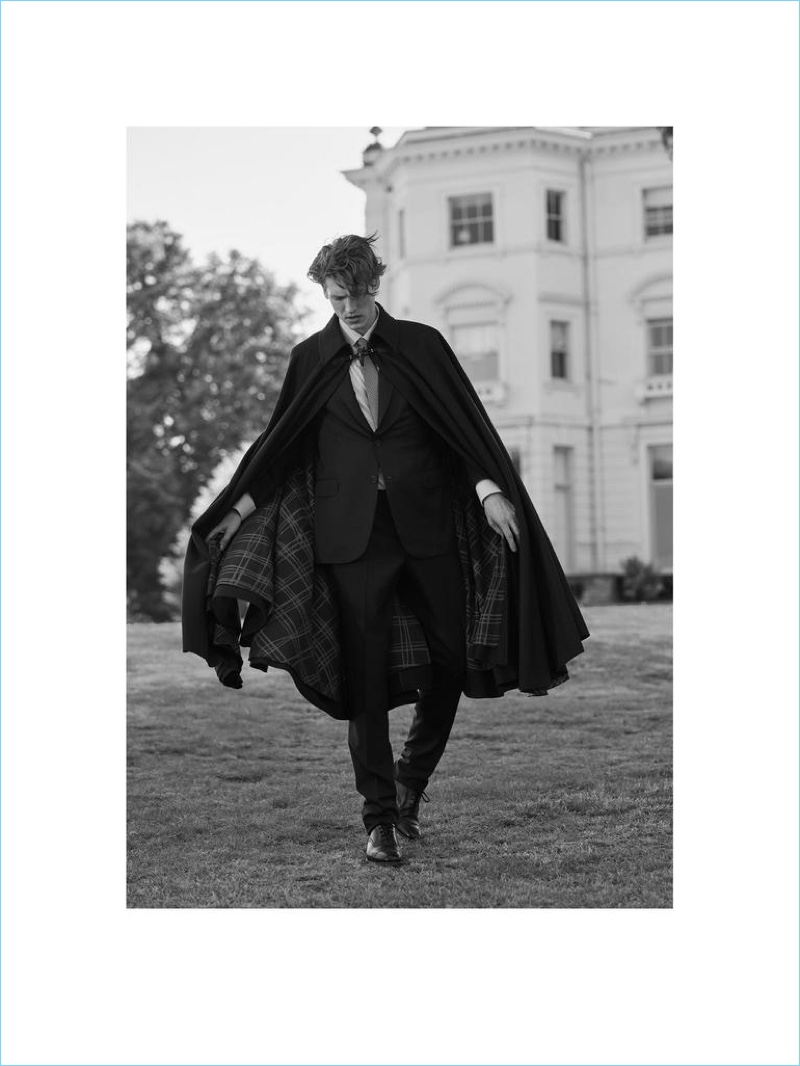 VIVIENNE WESTWOOD cape £1,115; BRIONI suit £6,870, shirt £410 and tie £170; CHURCH’S shoes £380