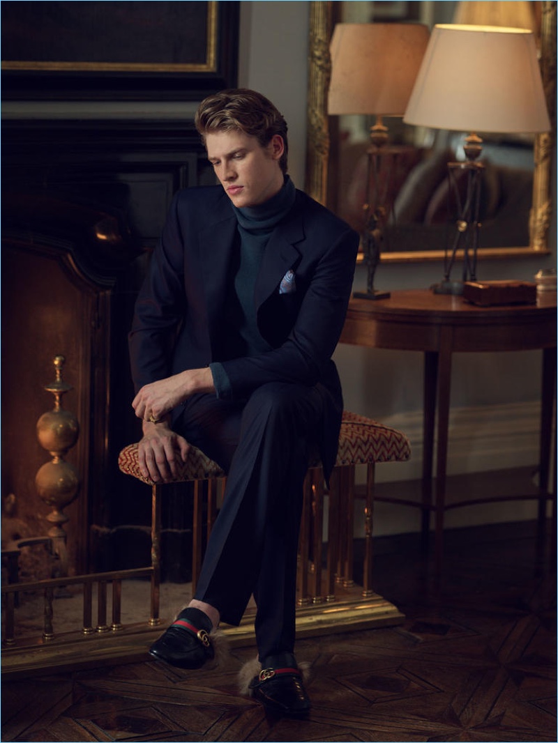 STEFANO RICCI suit £3,780; WOOYOUNGMI sweater £485; TURNBULL & ASSER pocket square £70; STEPHEN WEBSTER ring £6,100; GUCCI shoes £485