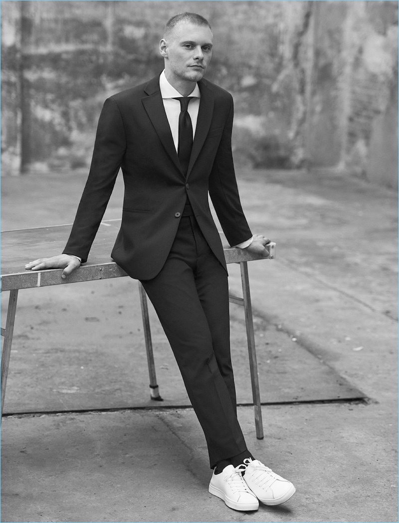 Embracing Mango Man's suave style, Julius Hjernø wears the brand's travel suit.