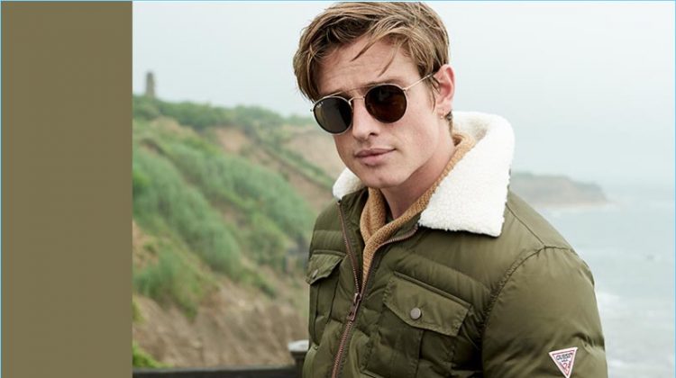 Tapping into military style, Patrick O'Donnell wears a GUESS quilted jacket with a fleece collar.