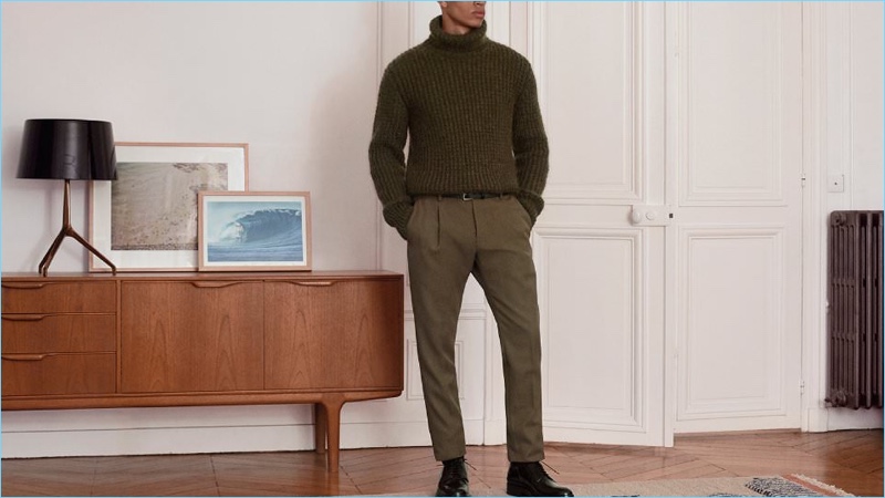 Face the cold with a Berluti waffle-knit turtleneck sweater. Military style reigns with the addition of olive Berluti trousers and Prada leather brogues.