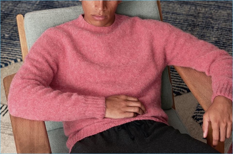 Add some color to your wardrobe with this pink Howlin sweater. Here, it's styled with Dries Van Noten wool-flannel trousers.