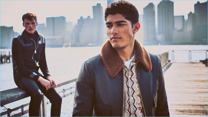 Torin Verdone models an AMI shearling-trimmed leather jacket with a Beams Plus printed shirt. He also wears a Sunspel t-shirt.