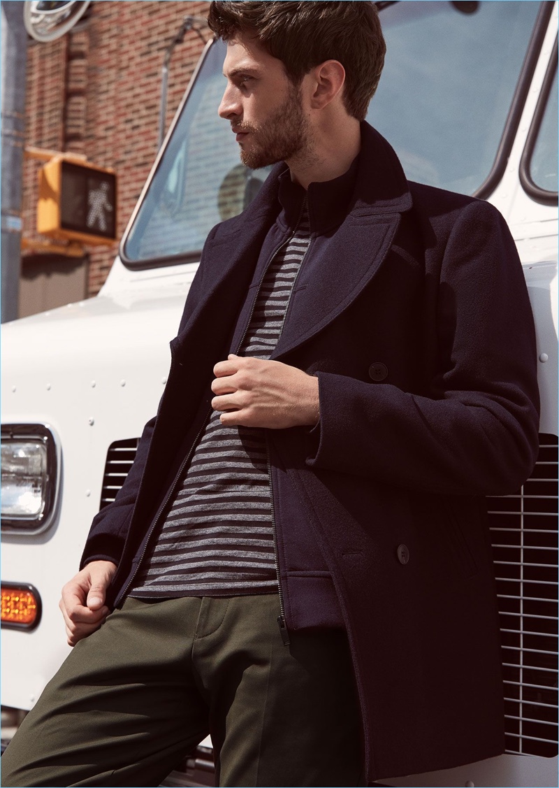 Fall in line with Reiss' wool-blend peacoat $540 in navy. Matthew Bell wears it with a stripe t-shirt $85, full-zip jumper $180, and slim-fit chinos $210.