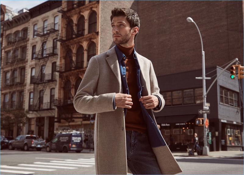 Freshen up your casual style with a sharp wool-blend overcoat $620 by Reiss. Here, it goes with a denim shirt $170, turtleneck sweater $170, and jeans $180.