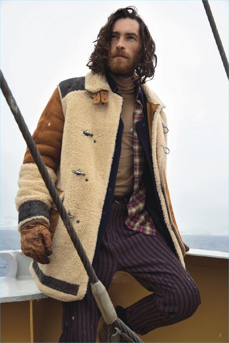 Calin Sitar wears a statement shearling jacket by Scotch & Soda.