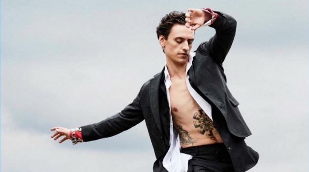 Rebel with a Cause: Sergei Polunin Poses for W Magazine Striking a pose, Sergei Polunin dons a Salvatore Ferragamo suit with a J.W. Anderson shirt. Polunin layers with a Charvet shirt and wears Dries Van Noten shoes.