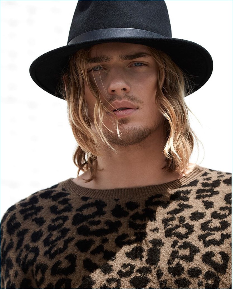 A rock 'n' roll vision, Ton Heukels wears a LE 31 leopard print sweater with a Brixton hat. » Glam Rock: Ton Heukels Models Cool Styles for Simons A rock 'n' roll vision, Ton Heukels wears a LE 31 leopard print sweater with a Brixton hat.