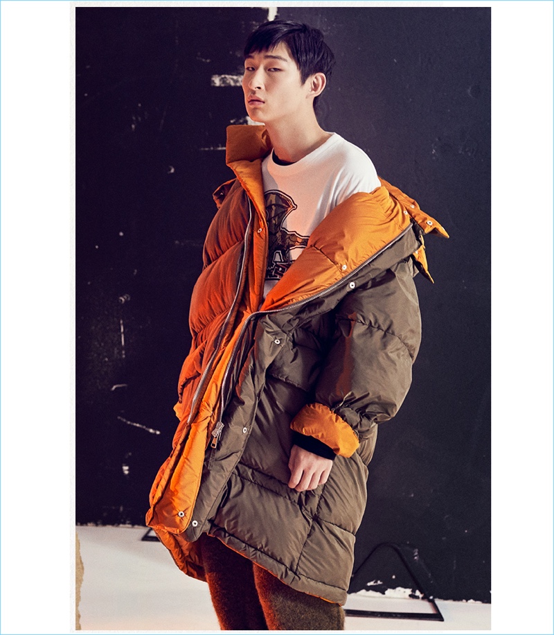 Embracing an oversize look, Sang Woo Kim wears a Stella McCartney puffa jacket. He also rocks the brand's track pants.