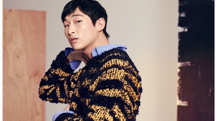 Making a texture play, Sang Woo Kim wears a Stella McCartney striped sweater and shirt.