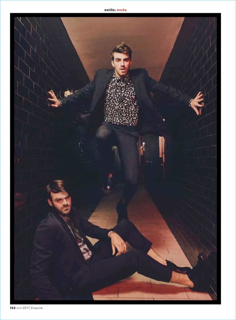 The Chainsmokers star in a new photo shoot. Alex wears a shirt and suit by Salvatore Ferragamo. He also sports Marcelo Burlon shoes. Meanwhile, Drew Taggart rocks a shirt and suit by AllSaints with Marcelo Burlon shoes.