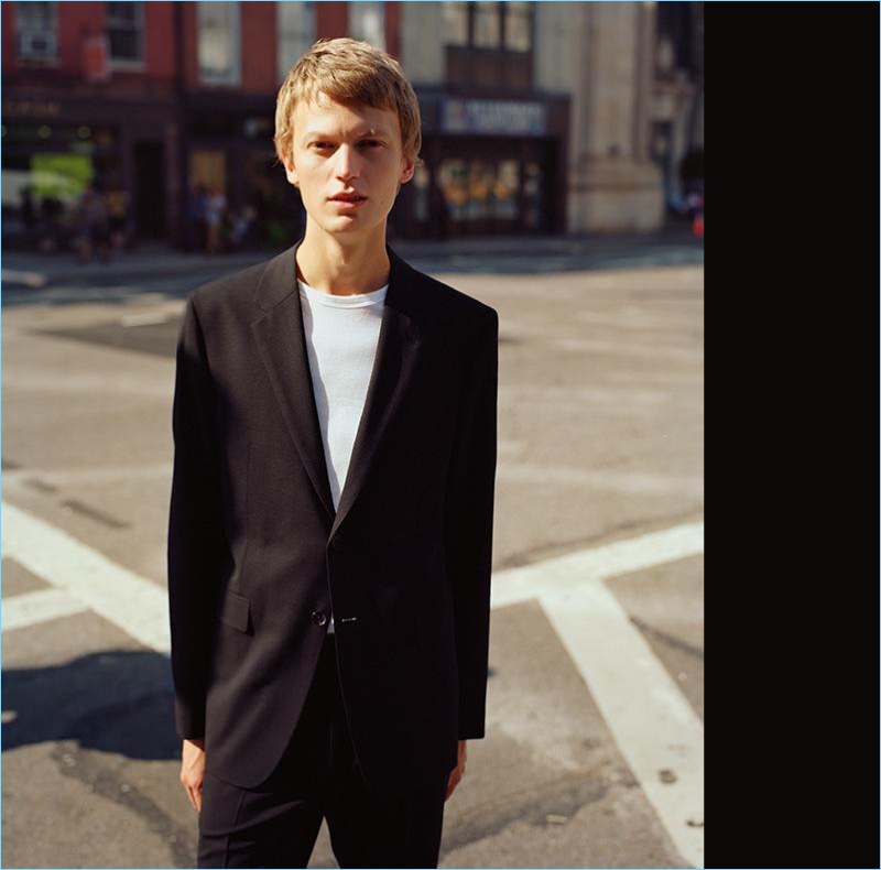 Taking to the streets of New York, Jonas Glöer wears a black Good Wool suit by Theory.