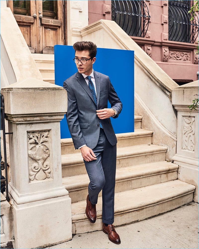 Wearing glasses and a suit, Francisco Lachowski appears in Vince Camuto's fall-winter 2017 campaign.