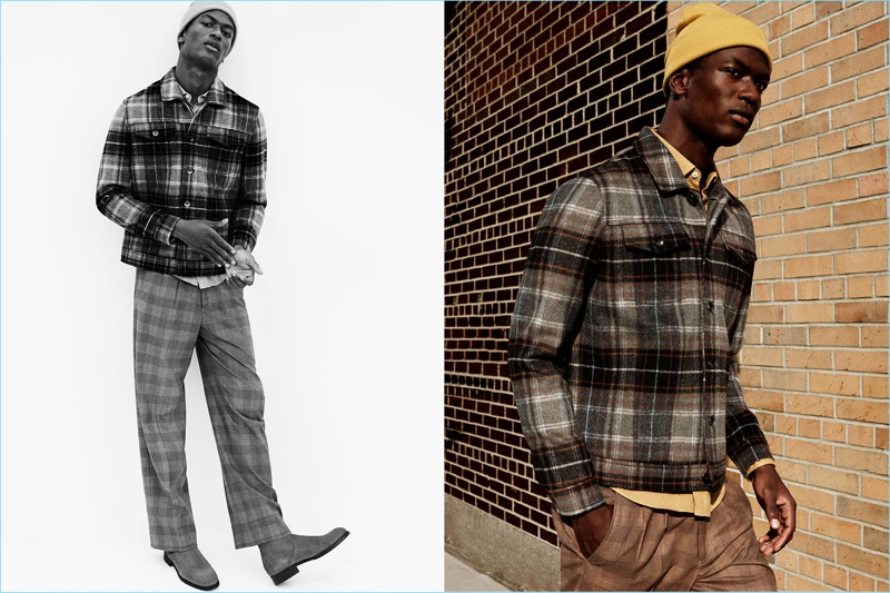 Hamid Onifade embraces fall's plaid trend. Connecting with Zara Man, he wears a plaid jacket and check trousers. The model adds a pop of color with a yellow shirt and knit beanie.