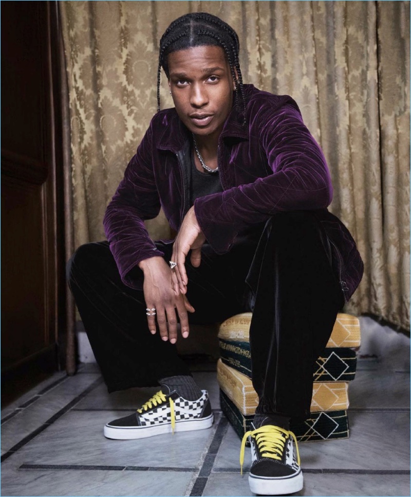 Connecting with GQ Style, A$AP Rocky wears a purple velvet jacket and tank by Berluti. Emporio Armani velvet trousers and Vans sneakers complete the look.