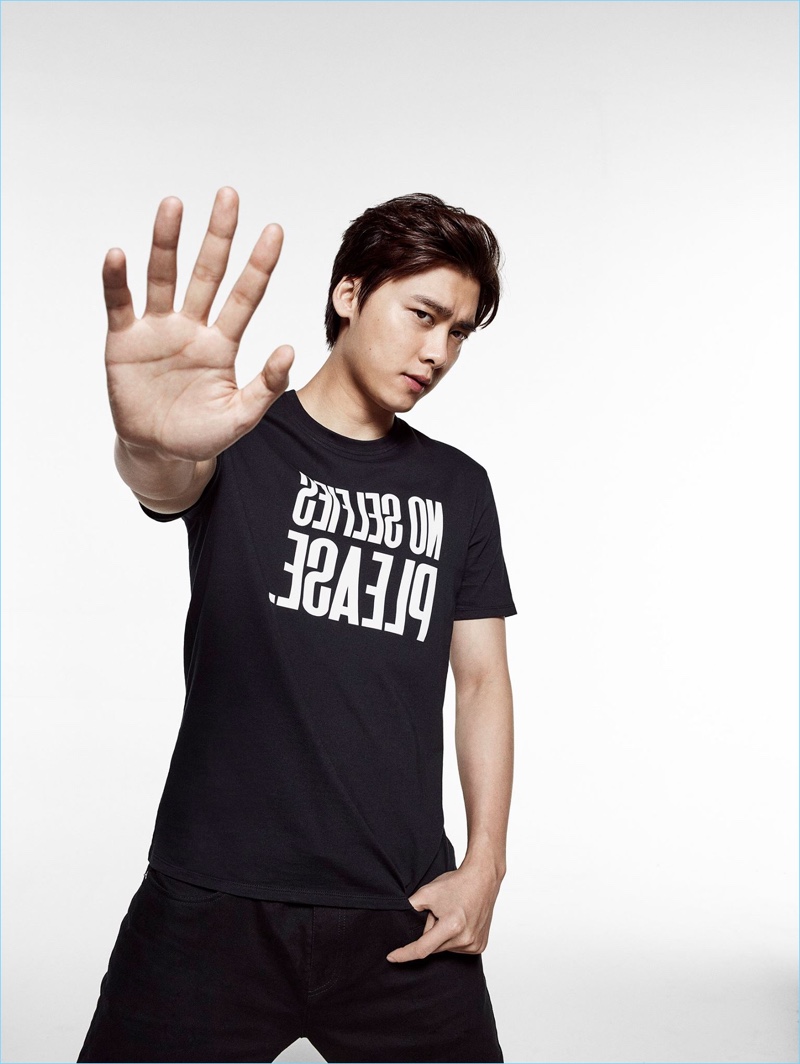 Actor Li Yifeng wears a "No Selfies Please" t-shirt for Armani Exchange's statement campaign.