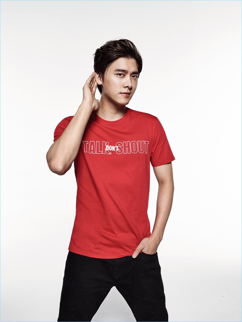 Li Yifeng wears a "Talk Don't Shout" t-shirt by Armani Exchange.