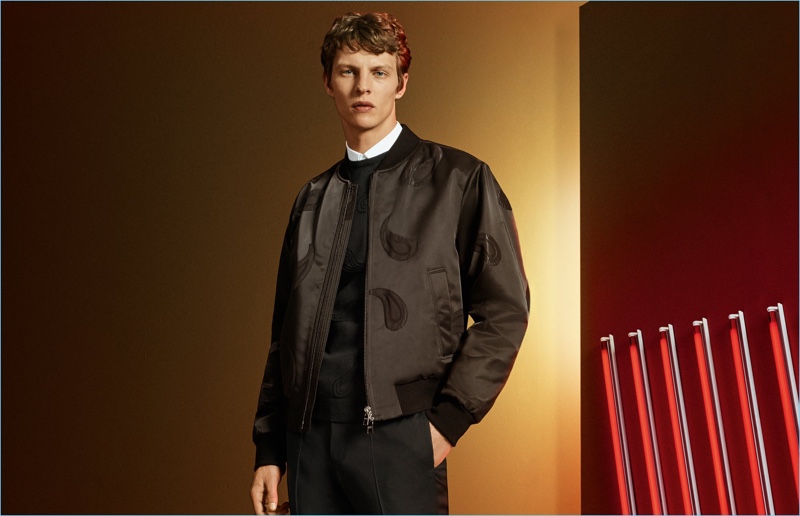 German model Tim Schuhmacher wears a bomber jacket from BOSS by Hugo Boss.