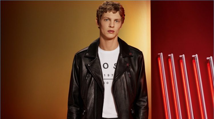 BOSS Hugo Boss Holiday 2017 Campaign 004 Tim Schuhmacher sports a leather biker jacket from BOSS by Hugo Boss.