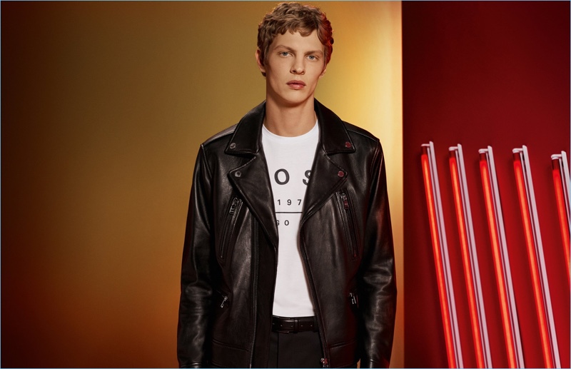 Tim Schuhmacher sports a leather biker jacket from BOSS by Hugo Boss.