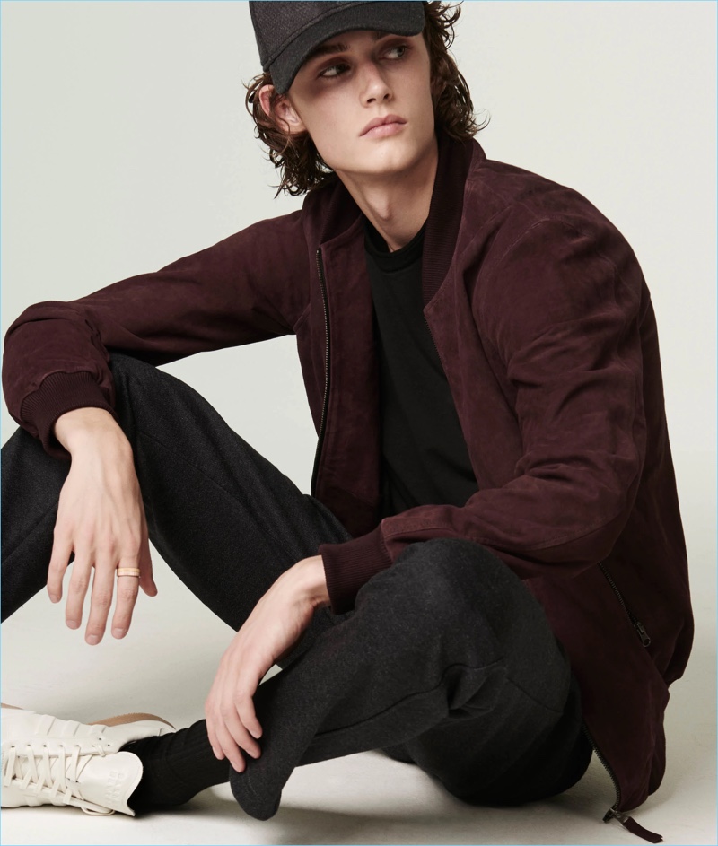 Several smart collaborations contribute to Barneys' lineup. The retailer parters with Lot 78 for a suede bomber jacket. It looks great with Barneys' New Era baseball cap. Complete the look with Barneys trousers and the retailer's Adidas sneakers.