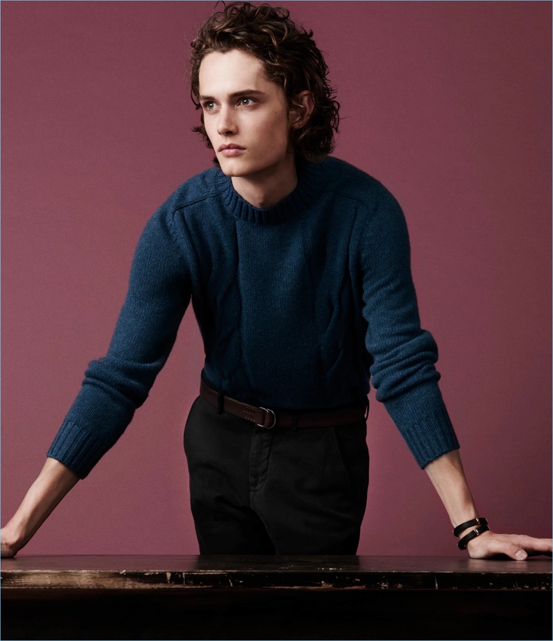 Demonstrate smart style with a Barneys New York cashmere sweater and trousers. Felisi's brown leather D-ring belt completes the outfit.